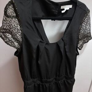 Black romper with lace sleeves
